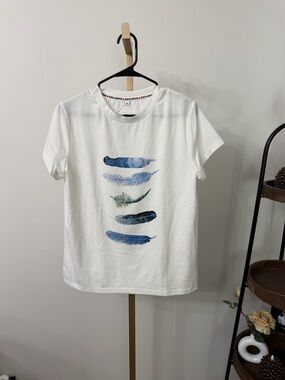 Exclusive White Graphic Tee with Blue Brushstroke